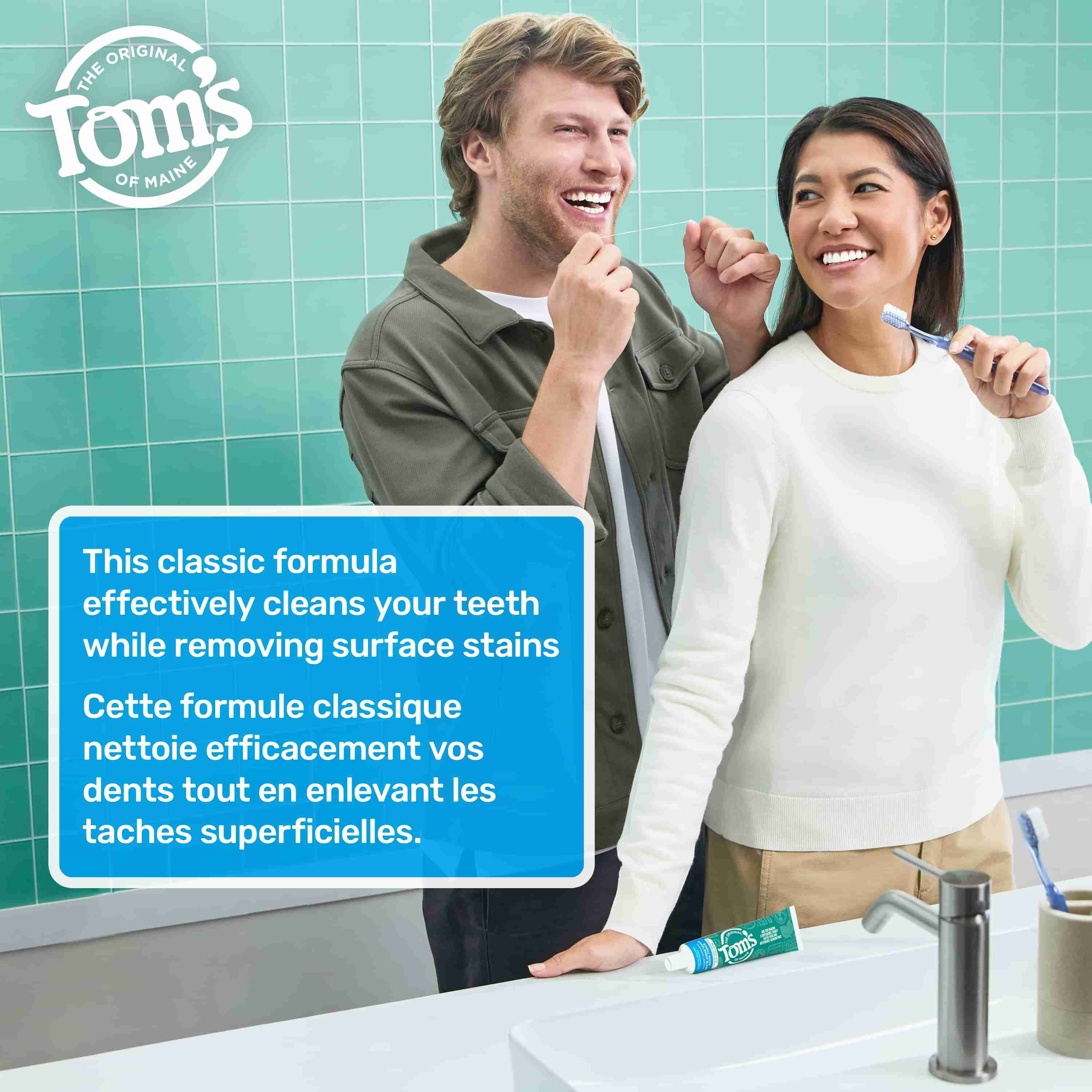 Couple in a bathroom, man holding dental floss and woman holding a toothbrush, representing oral care with Tom’s of Maine Simply White Fluoride Free Toothpaste, Peppermint.