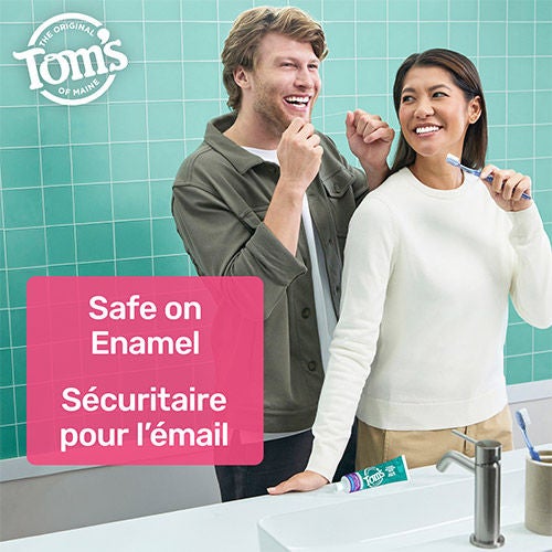 A man flossing and a woman holding a toothbrush, both smiling with healthy teeth in a bathroom. A pink text box highlights "Safe on Enamel" in English and French.